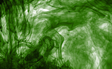 ink bright in water on black background