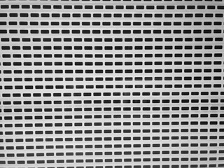 Metal mesh roller blind pattern, white for protection and safety.