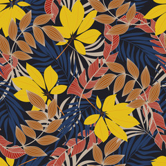 Summer seamless tropical pattern with bright yellow and red plants and leaves on a dark background. Vintage pattern.  Vector design. Jungle print. Floral background. 