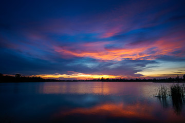 Fototapeta na wymiar Sunset at the lake landscape