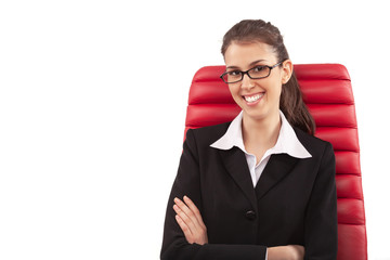 Young businesswoman or teacher arms crossed