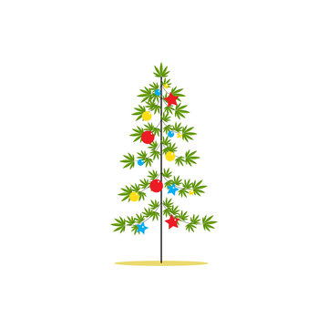 Christmas tree made from hemp branches decorated with balls and stars on a white background. Cannabis Christmas tree with decorations.