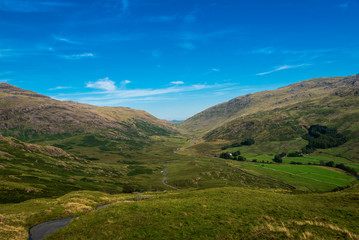 Fototapeta premium Through the scenic valleys and Mountains in Cumbra, Lake District