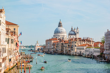 Fototapeta na wymiar View of Grand Canal and Basilica Santa Maria della Salute in Venice, Italy