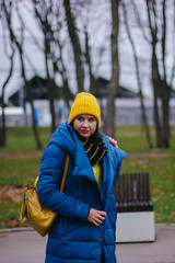 portrait of young woman in autumn park