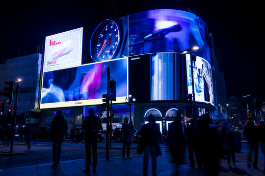 LONDON - NOVEMBER 13, 2019: People and traffic at Piccadilly Circus in London