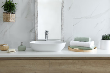 Fototapeta na wymiar Modern bathroom interior with stylish mirror and vessel sink