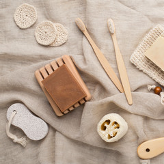 Fototapeta na wymiar Eco bathroom accessories, bamboo toothbrushes, reusable pads