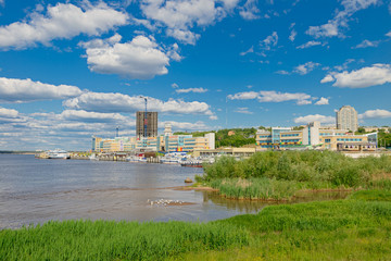 June 2, 2016: Picturesque embankment of the Volga River with a river port. Cheboksary. Russia.