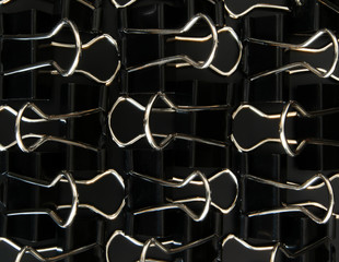 Foldback clips on dark background