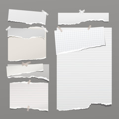Set of torn white, lined note, notebook paper strips and pieces stuck with sticky tape on dark grey background. Vector illustration