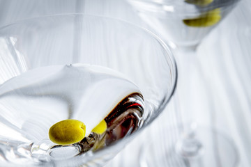 martini cocktail at wooden background close up