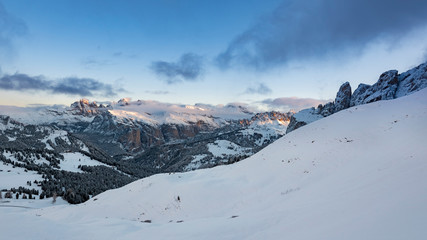 Fototapeta na wymiar Sunrise over snow covered Alps in South Tyrol, Italy - Deep snow and blue sky