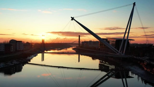 An aerial view at sunrise of Newport city centre, south wales United Kingdom, taken from the River Usk