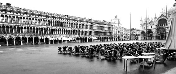 alfresco cafe with tables and chairs under the water in Venice I