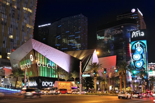 LAS VEGAS, USA - APRIL 13, 2014: Traffic at the Strip in Las Vegas. 15 of 25 largest hotels in the world are located at the strip with more than 60 thousand rooms.