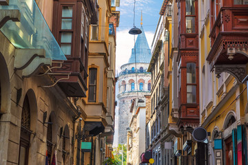 Fototapeta na wymiar Old Istanbul street and the Galata Tower, Turkey