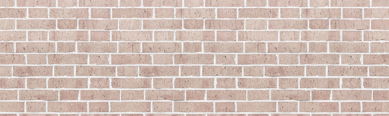 Wide light rough brick wall texture. Old masonry widescreen backdrop. Beige brickwork panoramic vintage background
