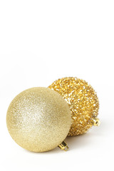 Golden Christmas shiny balls isolated on white background. Large glitter Christmas ornaments.	