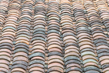 Colorful curved clay tiled roof from ancient house in the North Vietnam