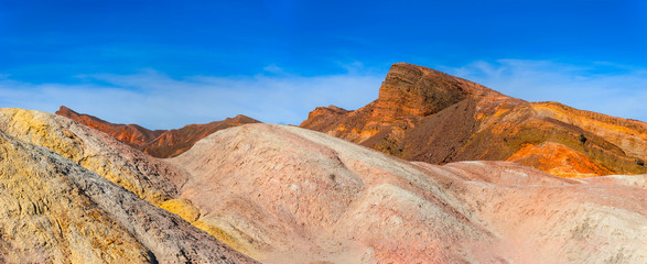 A bright rocky desert slope in Death Valley National Park.