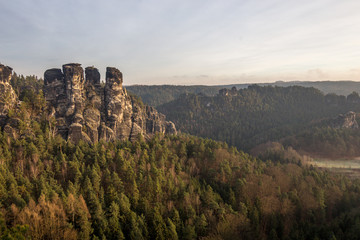 Fototapeta premium Panorama of Bastei rock formations, the bridge Bastei, Saxon Switzerland National park, Germany