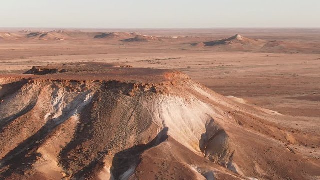 Aerial: Footage of Coober Pedy Breakaways. Tourism South Australia. Outback roadtrip.