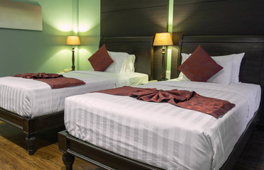 Double Bed with Table Lamp in The Bedroom Interior