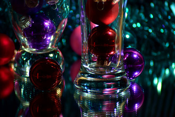 Composition with glass and Christmas toys