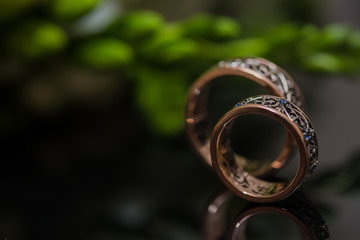 Two wedding rings in infinity sign. Love concept.