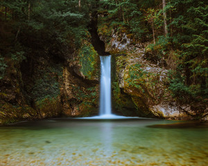 Waterfall in Slovenia in long exposure - obrazy, fototapety, plakaty
