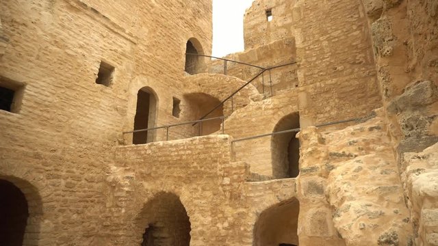 The ancient fortress of Ribat in Monastir, Tunisia. Old yellow bricks. View of the fortress from the bottom up