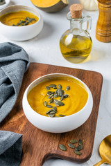 Pumpkin squash soup with seeds, olive oil