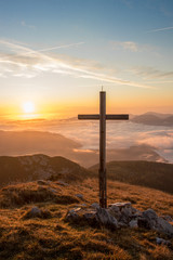 Big Cross next to morning sun, mountain Ogradi, Bohinj