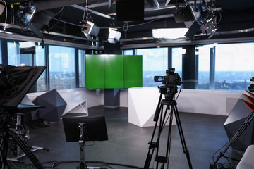 Modern video recording studio with professional cameras