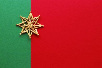 red and green christmas background with a straw star