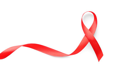 Red ribbon on white background. AID awareness concept
