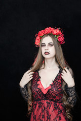 witch vampire girl in red dress with red veil - 303909842
