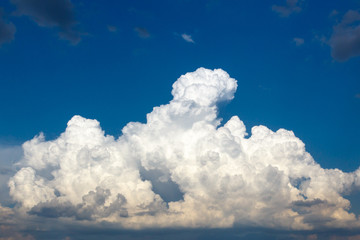 Naklejka na ściany i meble cumulus and high-cumulus clouds of an average tier on blue heavenly space