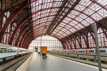 Fototapeta na wymiar Train on railway station platform, Europe