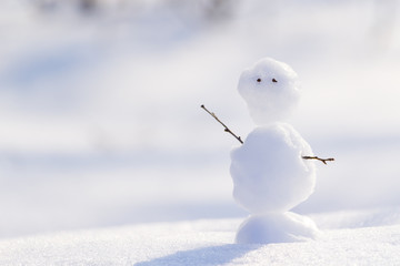 Snowman on a snow background. Concept: hello