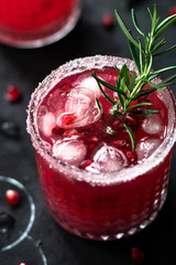 Pomegranate cocktail with rosemary