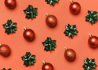 Christmas ornaments and bows on red background	