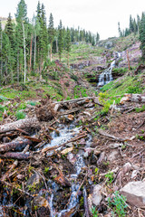 Waterfall view on trail to Ice lake near Silverton, Colorado in August 2019 summer morning with...