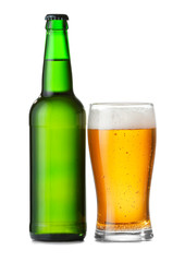 Bottle and glass of fresh beer on white background