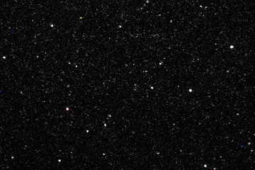 blue Sparkling Lights Festive background with texture. Abstract Christmas twinkled bright bokeh defocused and Falling stars. Winter Card or invitation	