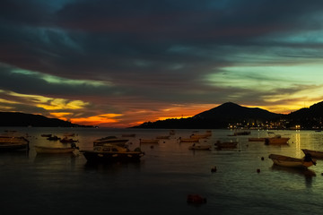 The fishing boats on the beach. Night.