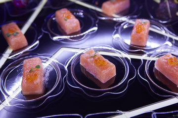 Beautifully decorated catering banquet table with different food snacks.