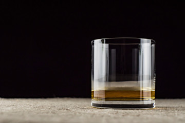 whiskey is poured into a glass