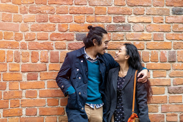 Happy young couple, walking through the old city, Warsaw, Poland